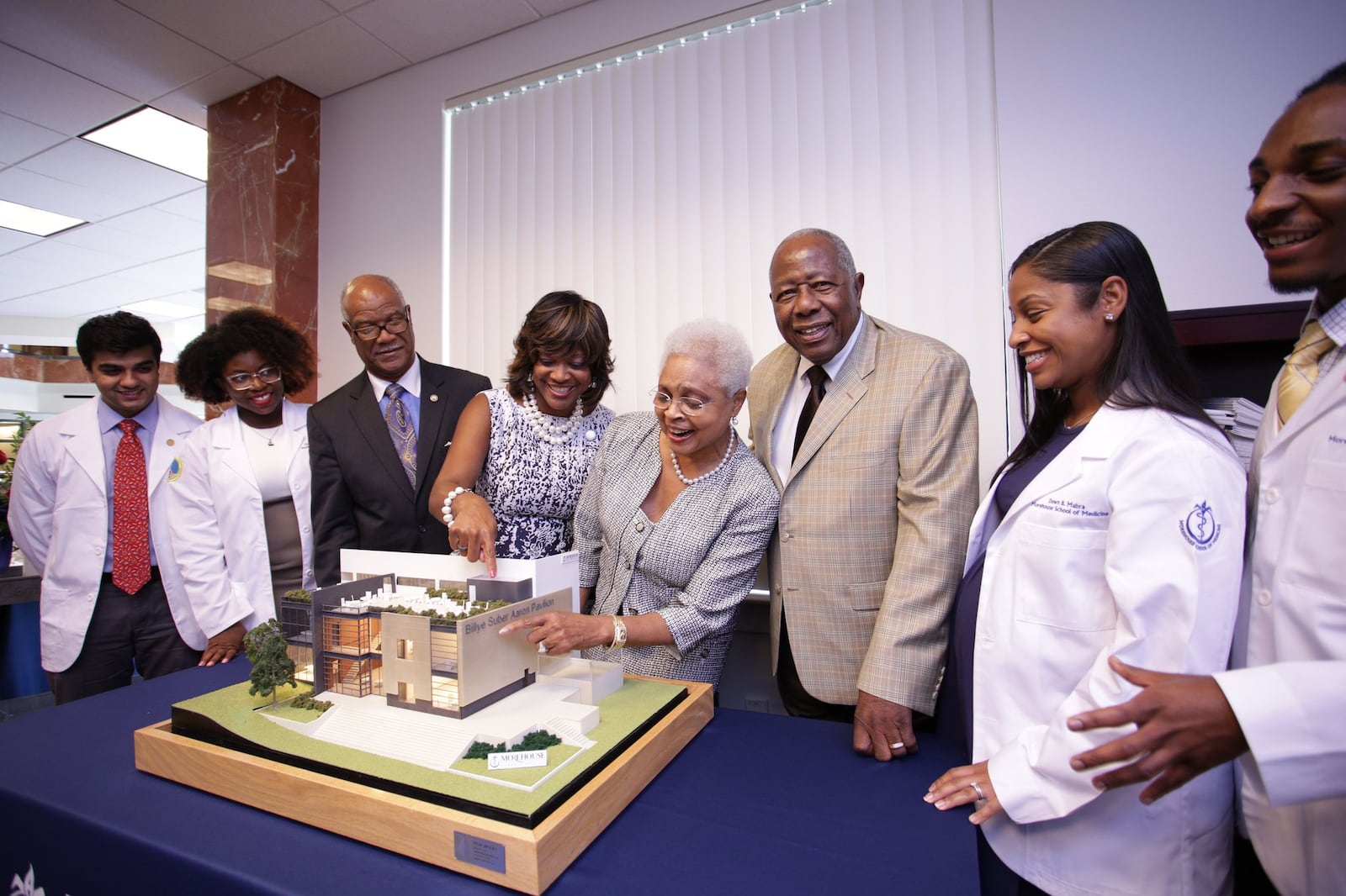 Hank and Billye Suber Aaron’s $3 million gift to Morehouse School of Medicine will be used to expand the Hugh Gloster Medical Education building and create the Billye Suber Aaron Student Pavilion. The gift was presented during the school’s 40th anniversary and 31st fall convocation, white coat and pinning ceremony. The participating students are MSM s largest first-year class of 159 M.D., M.P.H. and graduate students. PHOTO COURTESY MOREHOUSE SCHOOL OF MEDICINE