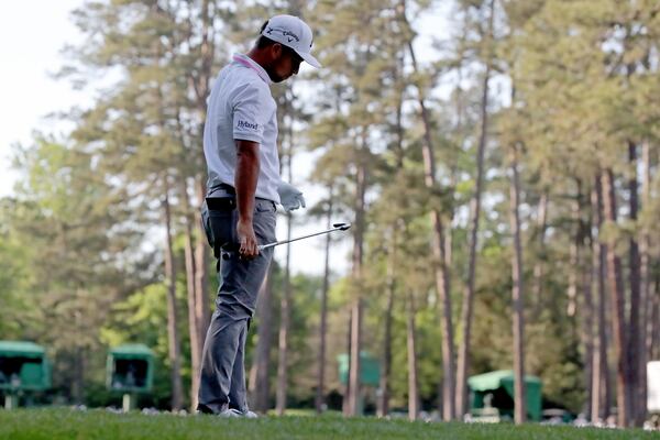 Xander Schauffele reacts after hitting his ball in the water on the 16th tee during the final round of the Masters Tournament Sunday, April 11, 2021, at Augusta National Golf Club in Augusta. (Curtis Compton/ccompton@ajc.com)