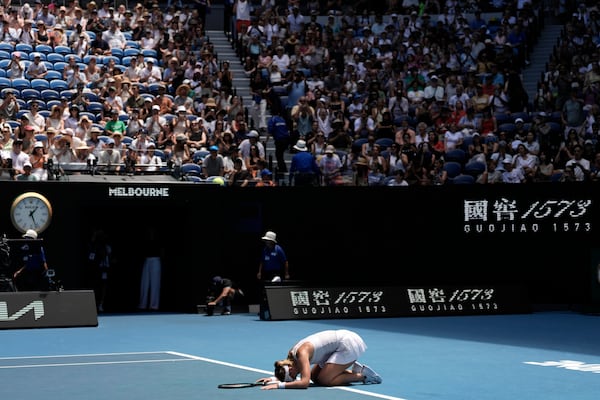 Paula Badosa of Spain celebrates after defeating Coco Gauff of the U.S. in their quarterfinal match at the Australian Open tennis championship in Melbourne, Australia, Tuesday, Jan. 21, 2025. (AP Photo/Ng Han Guan)