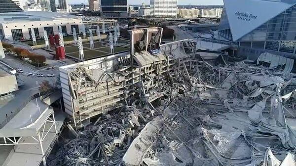 What’s left of the Georgia Dome after the first implosion on Nov. 20, 2017. One wall remained standing and is now scheduled for implosion in the middle of the night on Dec. 20, 2017.