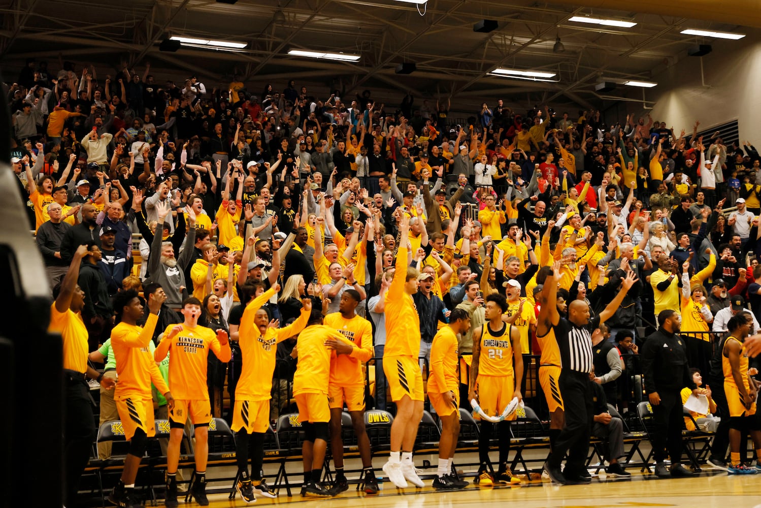 Kennesaw State's bench players and fans jumped from their seats after their team took the lead in the last minutes of the game.
 Miguel Martinez / miguel.martinezjimenez@ajc.com