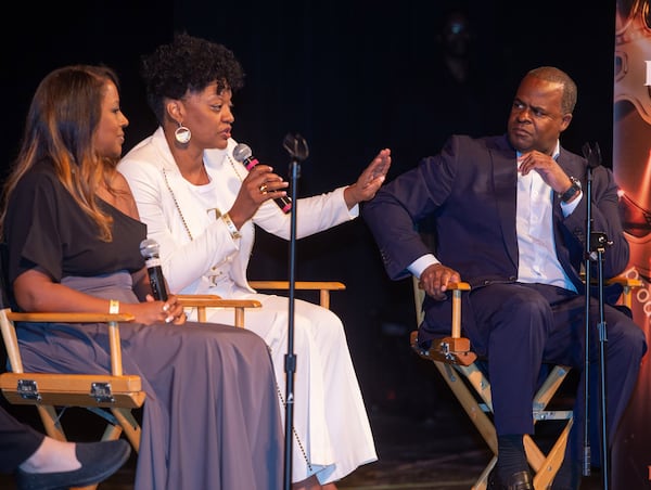 Former Atlanta Mayor Kasim Reed listens to Dana Evans, a former Atlanta principal convicted of racketeering, answer questions during a panel discussion after the Atlanta premiere of “One Child Left Behind: The Untold Atlanta Cheating Scandal.” The film was screened at the BronzeLens Film Festival at the Southwest Arts Center in Atlanta on Sunday, August 25, 2019. STEVE SCHAEFER / SPECIAL TO THE AJC