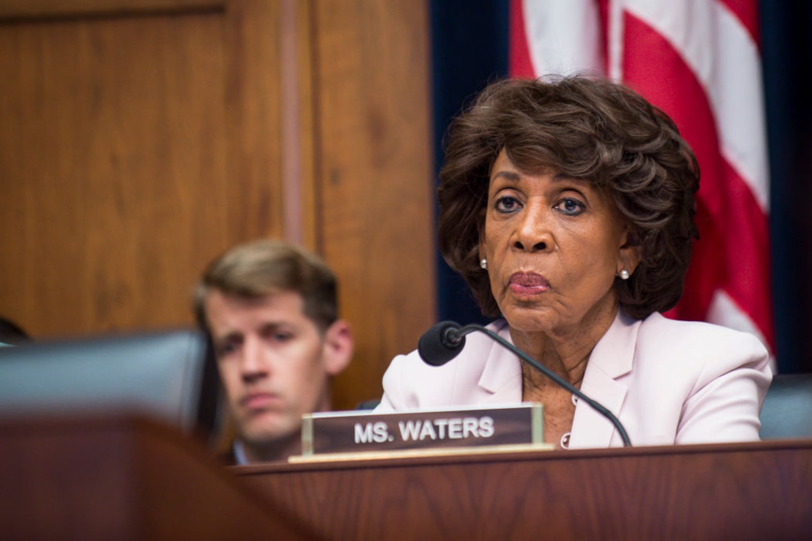 WASHINGTON, DC - JULY 12:  Ranking Member Maxine Waters (D-CA) looks on as Federal Reserve Board Chairwoman Janet Yellen testifies before the House Financial Committee about the State of the economy on July 12, 2017 in Washington, DC. Yellen said the Federal Reserve expects to begin shrinking its $4.5 trillion bond stimulus later this year. (Photo by Pete Marovich/Getty Images)