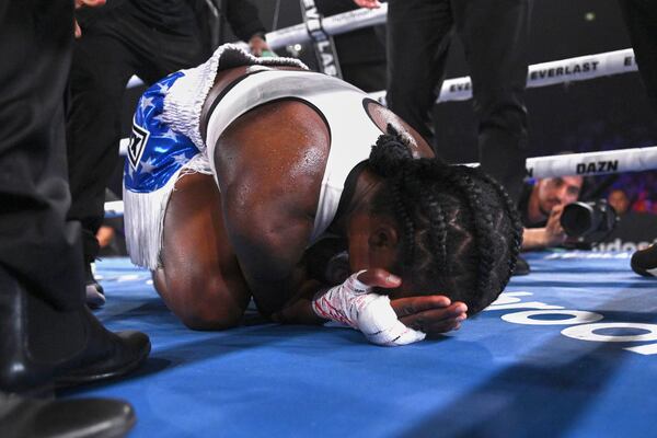 Former US police officer Tiara Brown reacts after defeating Skye Nicolson, of Australia, in a split-decision to win the WBC world featherweight champion at Qudos Bank Arena in Sydney, Saturday, March 22, 2025. (Dan Himbrechts/AAP Image via AP)