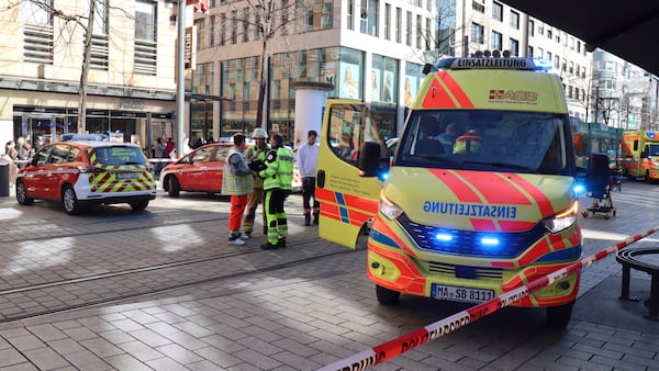 Emergency services and police stand at Paradeplatz in Mannheim, Germany, after a serious incident, Monday March 3, 2025. (René Priebe/dpa via AP)