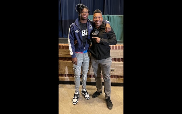 Former Collins Hill High standout Travis Hunter with Eagles assistant coach Frontia Fountain on Hunter's signing day in December 2021. Long committed to Florida State, Hunter shocked college football by announcing his signing with Jackson State. He later transferred to Colorado, following coach Deion Sanders. (Photo courtesy of Frontia Fountain)