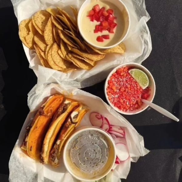 Jose's Birria Local serves birria tacos as well as sides like esquites. / Courtesy of Jose's Birria Local