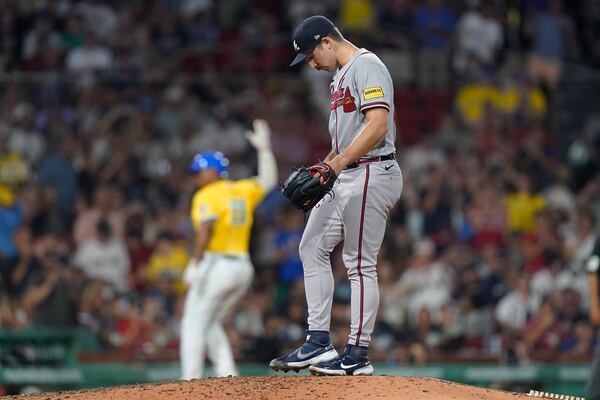 Atlanta Braves' Spencer Strider, right, stands on the mound as Boston Red Sox's Rafael Devers, left, runs the bases after hitting a home run in the sixth inning of a baseball game, Wednesday, July 26, 2023, in Boston. (AP Photo/Steven Senne)