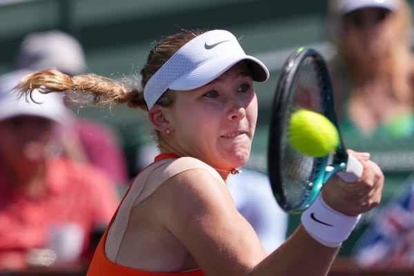 Mirra Andreeva, of Russia, returns to Aryna Sabalenka, of Belarus, during the final match at the BNP Paribas Open tennis tournament Sunday, March 16, 2025, in Indian Wells, Calif. (AP Photo/Mark J. Terrill)