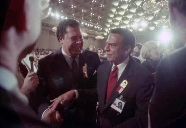  Andrew Young and Maynard Jackson celebrating after winning Olympic bid, 1990. (AJC FILE PHOTO)