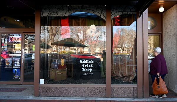 Exterior of Eddie's Trick Shop in Marietta Square, Tuesday, February 6, 2024, in Marietta. Eddie’s Trick Shop, which sells and rents costumes and accessories and magic tricks, has been a Marietta staple since the mid-1970s. They announced on Feb. 2 they are closing down later this month. Currently, they are selling everything 60% off and a good portion of the store has already bene emptied. (Hyosub Shin / Hyosub.Shin@ajc.com)