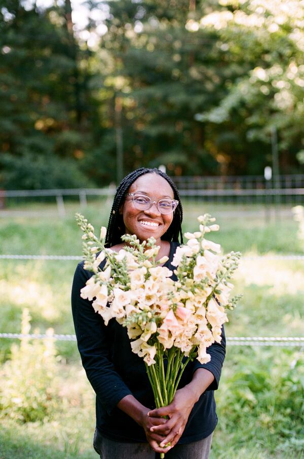 Whitney Jaye, co-owner of Sunbird Flowers in Lithonia is featured in the new book "Black Flora."