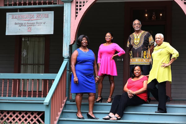 Hammonds House Museum executive director Leatrice Ellzy Wright (seated) poses with the museum staff (left to right) Donna Watts-Nunn, Ravi Windom, Wendell Hurst and Audrey Johnson. Contributed by Brian Christian