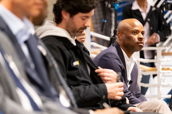 Tope Awotona, CEO of Calendly, listens during a program to celebrate the one-year anniversary of the City of Atlanta’s Office of Technology and Innovation on Tuesday, Jan. 9, 2024.   (Ben Gray / Ben@BenGray.com)