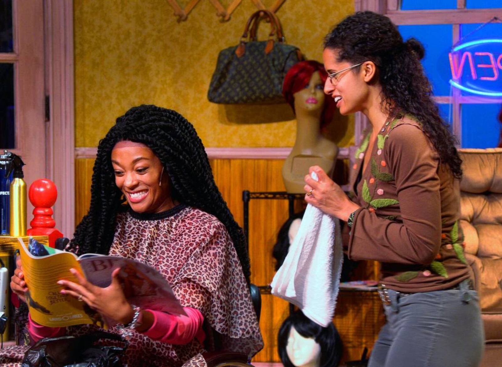 Aleigha Burt (Shelby), left, and Courtney Locke (Annelle), rehearse Wednesday night for the Springer Opera House production of “Steel Magnolias.” (Courtesy of Mike Haskey)