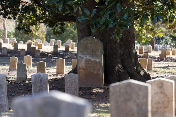 Pvt. Lucien Brahan Weakley’s weathered headstone stands beneath a towering magnolia tree that is surrounded by the graves of thousands of other Confederate soldiers in Atlanta’s Oakland Cemetery. Cracked and then repaired, the marker says the Tennessee native died in Atlanta in 1863, a month after he was mortally wounded in the bloody Battle of Chickamauga. Using newly released census returns, researchers say Weakley was among 698,000 people who died because of the Civil War. (Arvin Temkar / AJC)