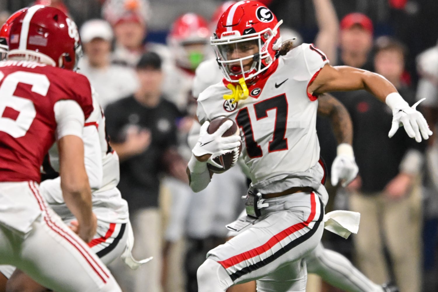 Georgia Bulldogs wide receiver Anthony Evans III (17) runs agains the Alabama Crimson Tide defense during the second half of the SEC Championship football game at the Mercedes-Benz Stadium in Atlanta, on Saturday, December 2, 2023. (Hyosub Shin / Hyosub.Shin@ajc.com)