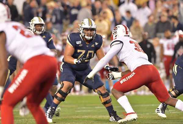 Georgia Tech tackle Jared Southers (70) sets a block against North Carolina State Thursday night. (Hyosub Shin / Hyosub.Shin@ajc.com)