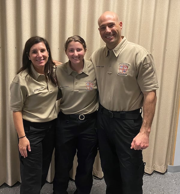 Linda Matzigkeit (left), the chief administrative officer for Children's Healthcare of Atlanta, attended the Grady EMT Academy after the COVID pandemic to get trained to care for patients. Courtesy of Linda Matzigkeit