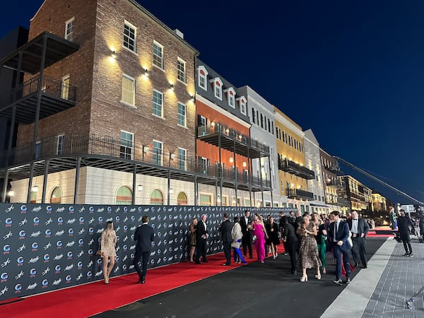 The Assembly opening gala Oct. 21, 2023 in Doraville featured a red carpet outside a filmable facade that mimics New Orleans. RODNEY HO/rho@ajc.com