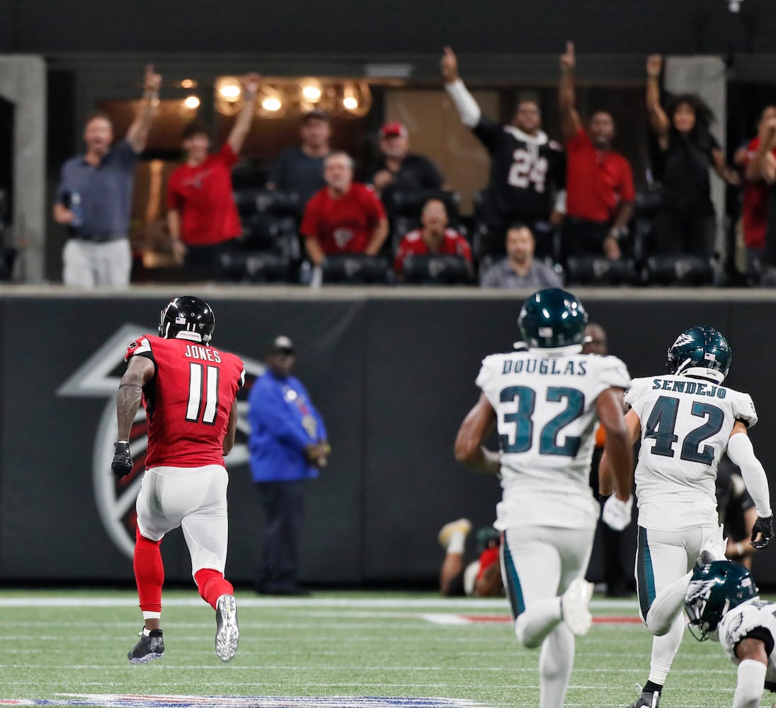 Photos: Falcons outlast Eagles for first win