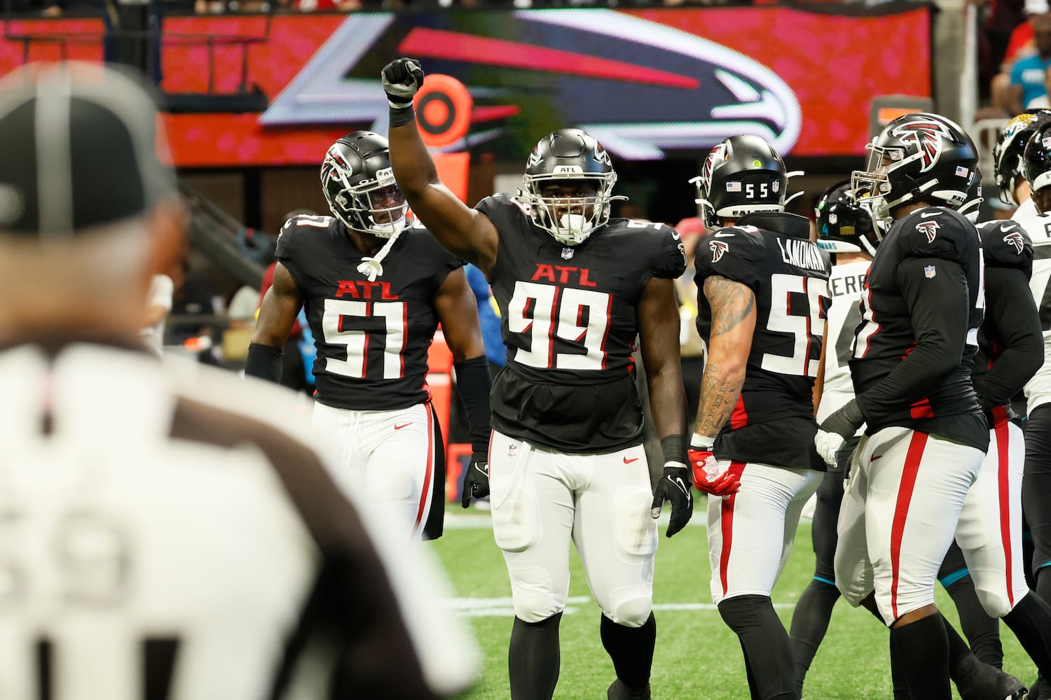 Atlanta Falcons' defensive tackle Derrick Tangelo (99) races after a play during the second half of an NFL exhibition game against the Jacksonville, Jaguars on Saturday, August 27, 2022, at the Mercedes-Benz Stadium in Atlanta, Ga.
 Miguel Martinez / miguel.martinezjimenez@ajc.com