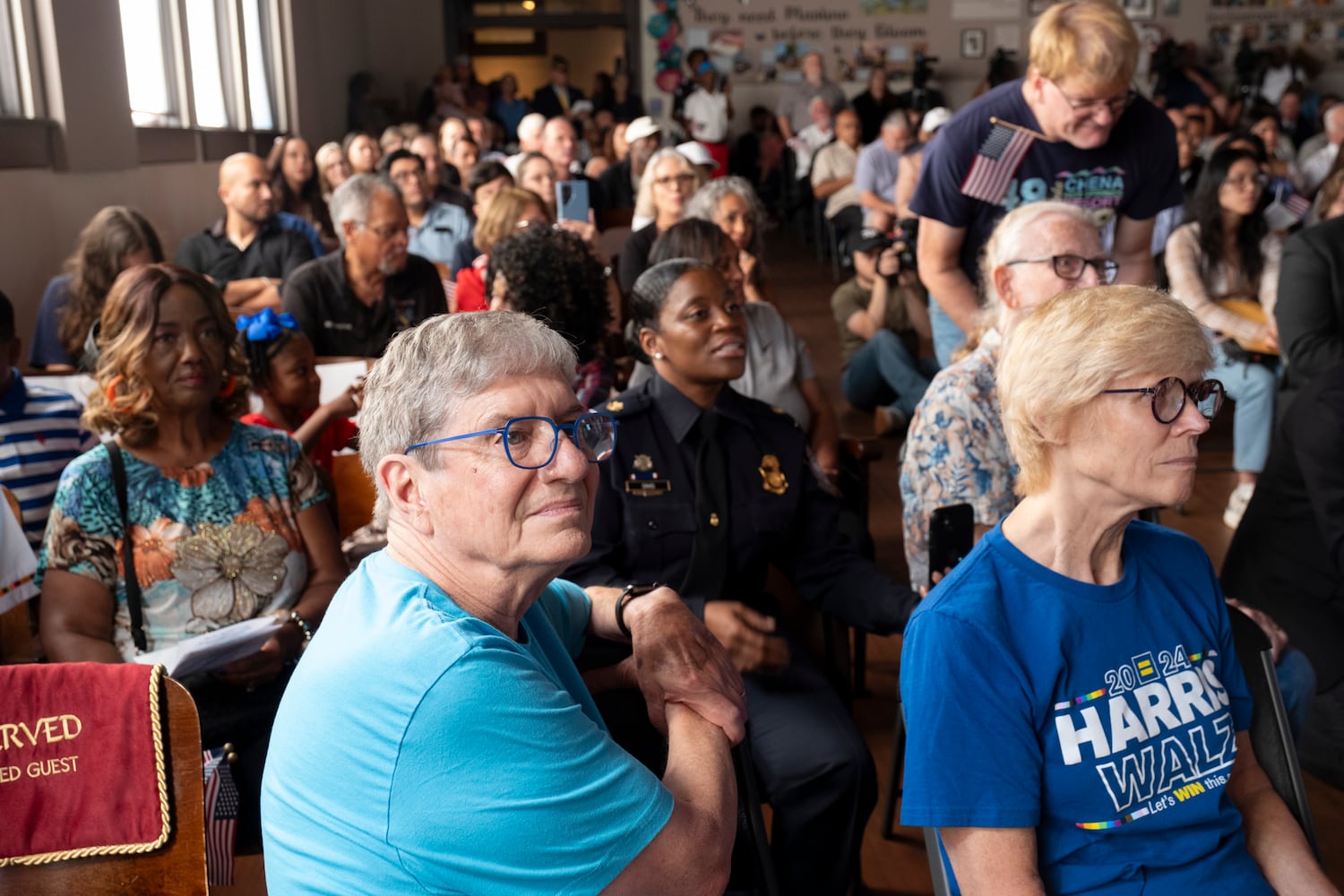 Chip Carter, son of President Jimmy Carter, and his wife Becky watch a Naturalization ceremony at Jimmy Carter National Historic Park in Plains on Tuesday, Oct. 1, 2024. The ceremony was held in honor of President Carter’s 100th birthday.  Ben Gray for the Atlanta Journal-Constitution