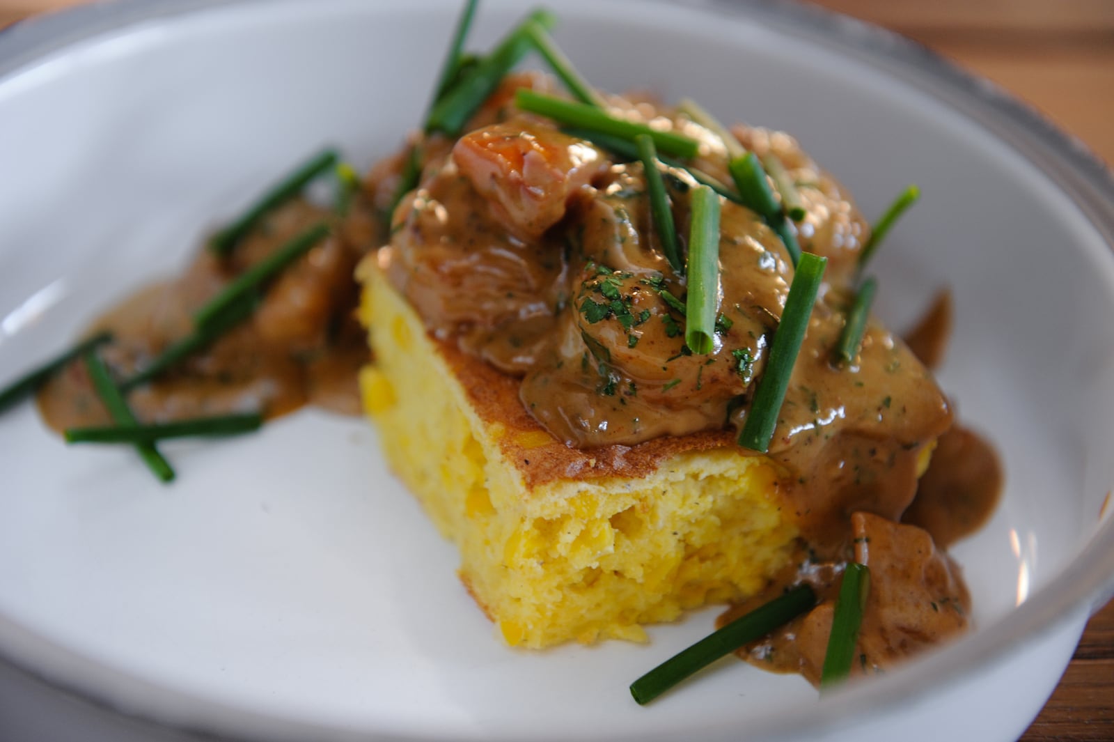 Barbecue shrimp with spoonbread, tomato, and Worcestershire from W.H. Stiles Fish Camp. / (Beckystein.com)