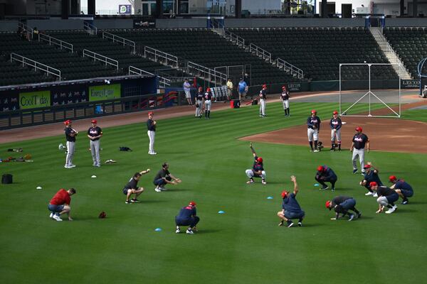 Atlanta Braves players warm up on the baseball field during spring training workouts at CoolToday Park, Thursday, February 13, 2025, North Port, Florida. (Hyosub Shin / AJC)