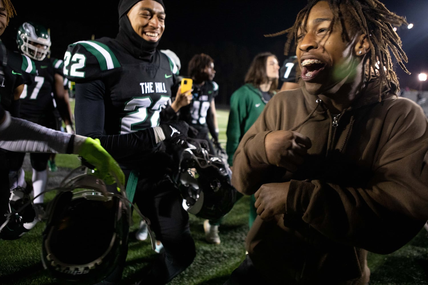 Collins Hill players celebrate after winning a GHSA high school football game between the Collins Hill Eagles and the Grayson Rams at Collins Hill High in Suwanee, GA., on Friday, December 3, 2021. (Photo/ Jenn Finch)