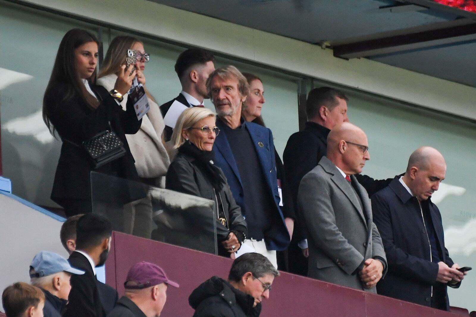 Manchester United owner Sir Jim Ratcliffe, center, looks out from the stands prior the English Premier League soccer match between Aston Villa and Manchester United, at Villa Park in Birmingham, England, Sunday, Oct. 6, 2024. (AP Photo/Rui Vieira)