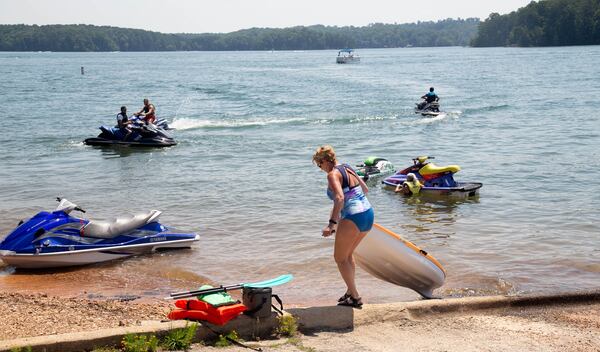 People get their watercrafts ready at the boat launch at Mary Alice Beach Park in Lake Lanier on Sunday, July 5, 2020.  STEVE SCHAEFER FOR THE ATLANTA JOURNAL-CONSTITUTION