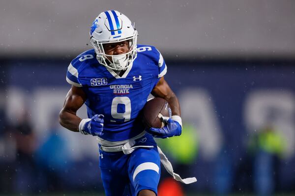 Blue Team wide receiver Jacari Carter (9) scores a touchdown during the Spring Game at Center Parc Stadium, Thursday, March 9, 2023, in Atlanta. Jason Getz / Jason.Getz@ajc.com)