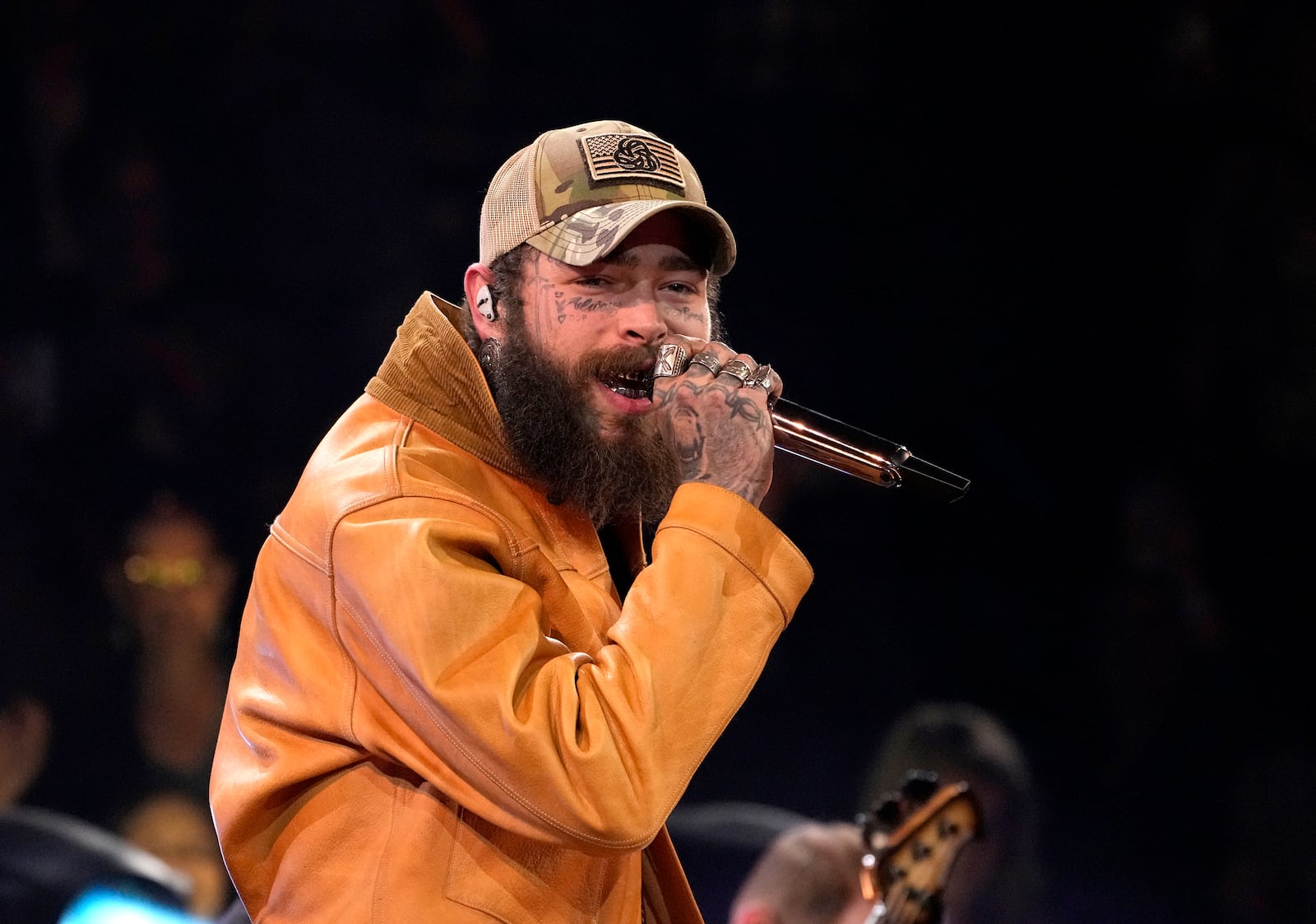 FILE - Post Malone performs a medley at the 57th Annual CMA Awards on Wednesday, Nov. 8, 2023, in Nashville, Tenn. (AP Photo/George Walker IV, File)