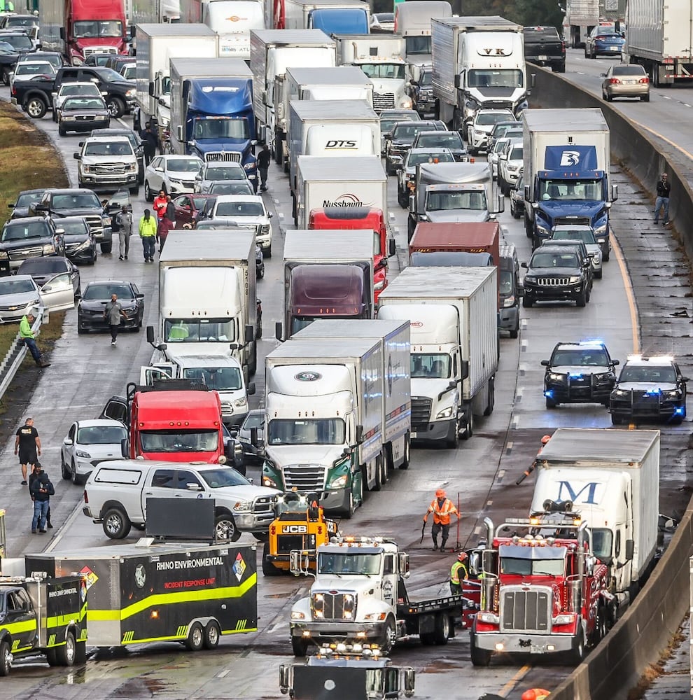 2 East Point officers hurt in I-285 crash near airport; traffic jammed for miles