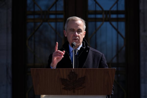 Canada Prime Minister Mark Carney speaks to media at Rideau Hall, where he asked the Governor General to dissolve Parliament and call an election, in Ottawa, Sunday, March 23, 2025. (Adrian Wyld/The Canadian Press via AP)