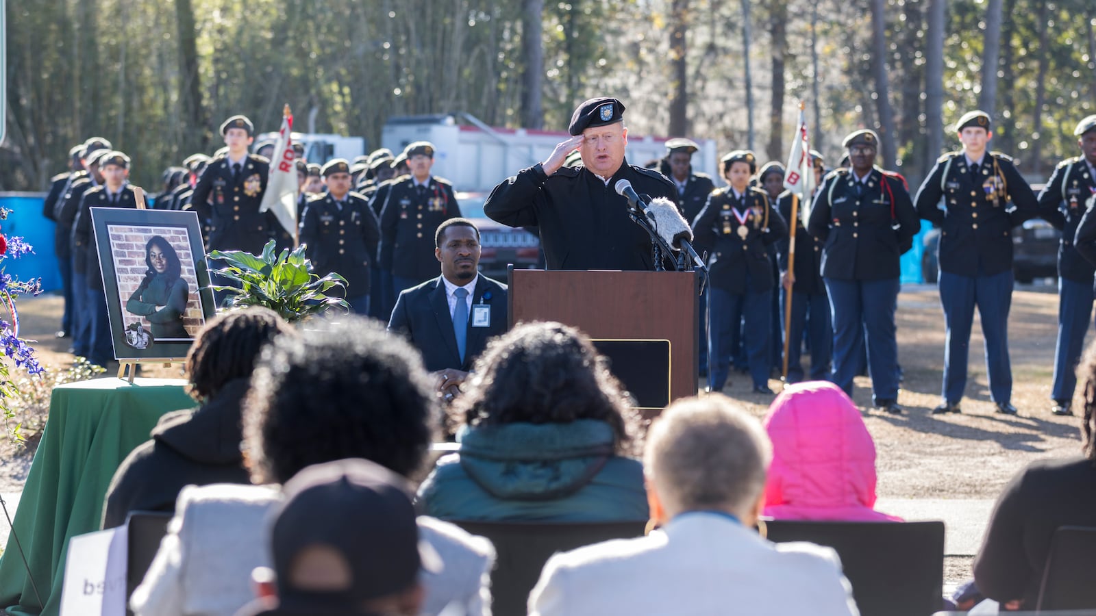 SAVANNAH, GA - FEBRUARY 01, 2024: U.S. Lt Col (Ret) Michael Busteed salutes during his remarks during a ceremony to honor the memory of Breonna Moffett, Thursday, Feb. 1, 2024, at Windsor Forest High School in Savannah, Ga. Moffitt joined the Army Reserve in 2019 after graduating from high school. (Stephen B. Morton for the AJC)