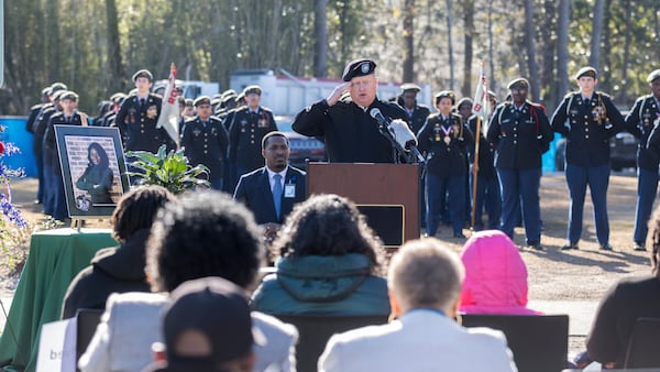 SAVANNAH, GA - FEBRUARY 01, 2024: U.S. Lt Col (Ret) Michael Busteed salutes during his remarks during a ceremony to honor the memory of Breonna Moffett, Thursday, Feb. 1, 2024, at Windsor Forest High School in Savannah, Ga. Moffitt joined the Army Reserve in 2019 after graduating from high school. (Stephen B. Morton for the AJC)