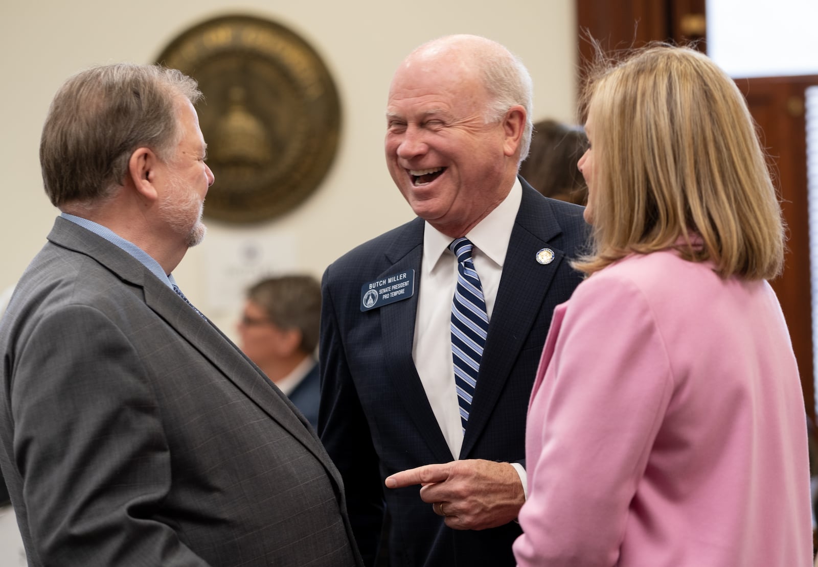 220308-Atlanta-Sens. Butch Miller (R-Gainesville), center,  and Jeff Mullis (R-Chickamauga) talk just before Miller qualified to run for Lieutenant Governor during the second day of qualifying Tuesday, Mar. 8, 2022 at the Georgia State Capitol. Mullis is not running for reelection. Ben Gray for the Atlanta Journal-Constitution