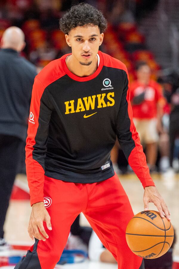 Atlanta Hawks forward Zaccharie Risacher (10) warms up during the first half of an NBA basketball game against the Brooklyn Nets on Wednesday, Oct. 23, 2024, in Atlanta. (AP Photo/Jason Allen)