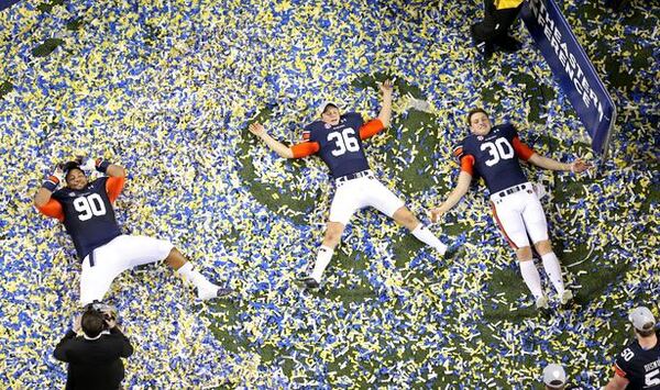 Auburn players were so tired after the SEC title game they needed to lie down. (Jason Getz/AJC)