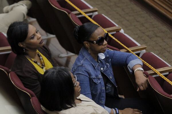 Sisters of slain Georgia correctional officer Curtis Billue watch the court proceedings on Wednesday, June 21. BOB ANDRES/AJC