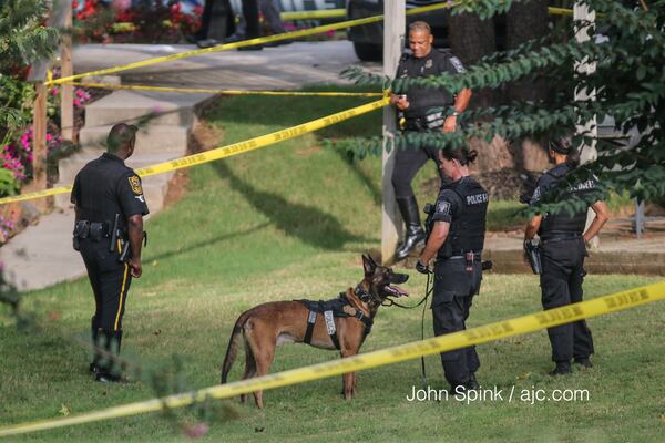 A 47-year-old homeowner was shot and killed early Friday during a home invasion in DeKalb County. Officers used police dogs to try to track the scents of the intruders. JOHN SPINK / JSPINK@AJC.COM