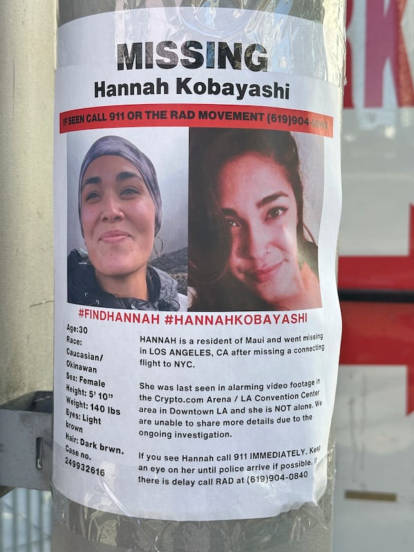 A flyer with information on Hannah Kobayashi, currently missing, is displayed Thursday, Nov. 21, 2024 in Los Angeles. (AP Photo/Damian Dovarganes)