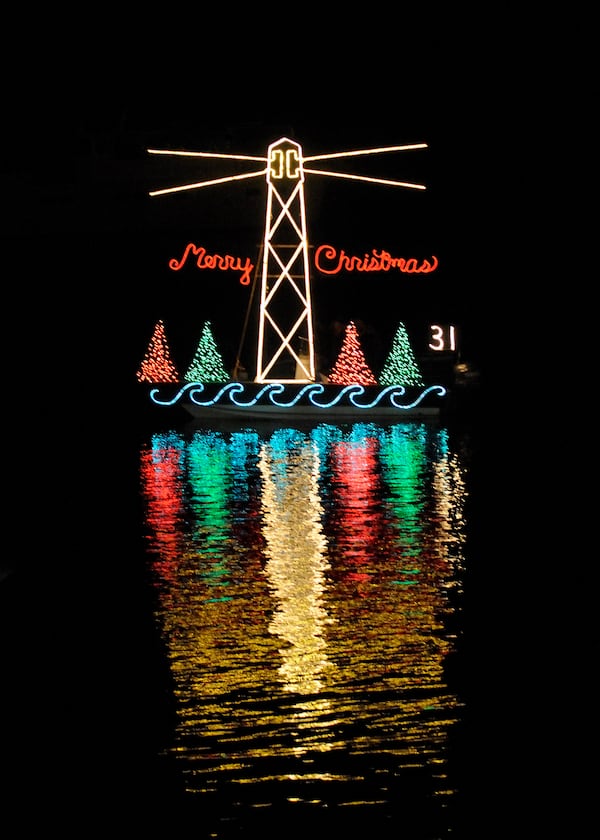 Dozens of boats flaunt their holiday finery in the Crystal Coast Christmas Flotilla in Beaufort, N.C. CONTRIBUTED