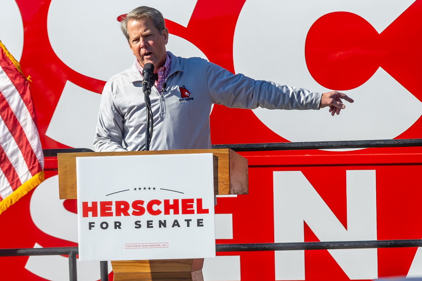 Gov. Brian Kemp talks to the crowd during a Smyrna rally with Republican U.S. Senate hopeful Herschel Walker Saturday, November 19, 2022.   (Steve Schaefer/steve.schaefer@ajc.com)