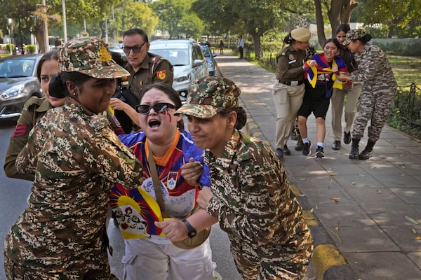 Police detain protesting exile Tibetans during a protest outside Chinese embassy to mark the 1959 uprising in Tibet against the Chinese rule on this day, in New Delhi, India, Monday, March, 10, 2025. (AP Photo/Manish Swarup)