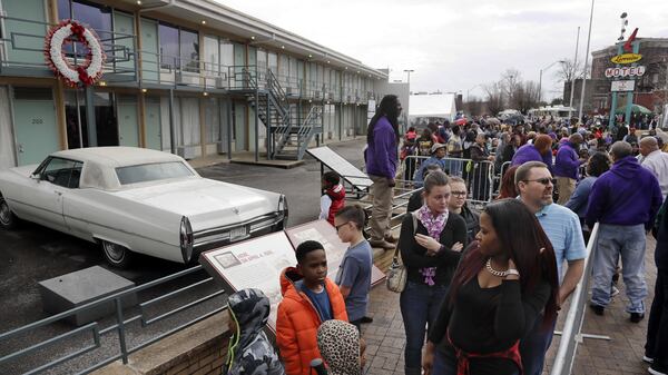 FILE - In this Monday, Jan. 16, 2017, file photo, people wait in line to enter the National Civil Rights Museum on Martin Luther King Jr. Day in Memphis, Tenn. The site is among about 130 locations in 14 states being promoted as part of the new U.S. Civil Rights Trail, which organizers hope will boost tourism in the region. (AP Photo/Mark Humphrey, File)