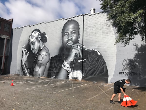 A new 30-foot-tall mural of Atlanta hip-hop legends OutKast was painted on the side of a building in Atlanta's Little Five Points neighborhood. TYLER ESTEP / TYLER.ESTEP@AJC.COM