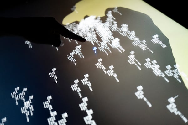 An Interactive nautical map shows locations of boats around the Senegalese offshore patrol vessel Niani during a mission to search for illegal migrant boats near the coast of Dakar, Senegal, Saturday, Nov.16, 2024. (AP Photo/Sylvain Cherkaoui)